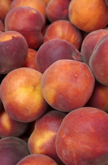 Wall Mural - fresh peaches at the market. selective focus