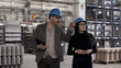 © Stock57 - man and woman business meeting in industrial plant