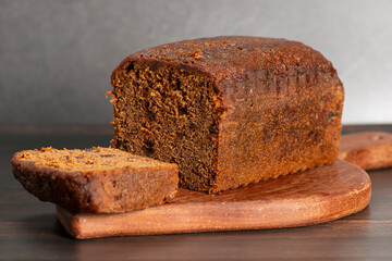 Detailed closeup of a classic date loaf, bread background.