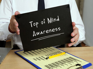 business concept meaning top of mind awareness with phrase on the sheet.