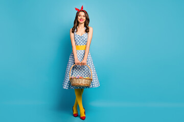 Poster - Full length body size view of her she nice-looking attractive lovely pretty charming cheerful cheery girl carrying straw basket isolated on bright vivid shine vibrant blue color background