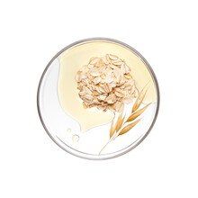 Pile Of Oatmeal With Essence On Petri Dish Over White Background