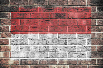 Indonesia flag painted on brick wall background