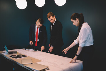 Wall Mural - Group of colleagues working on project together