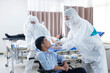 © Thirawatana - Doctors and staff to prevent COVID 19 Checking and treating patients in a controlled area, state quarantine.