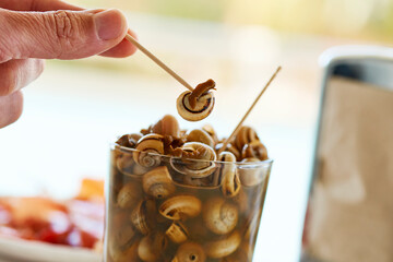 Wall Mural - man about to eat a spanish recipe of snails