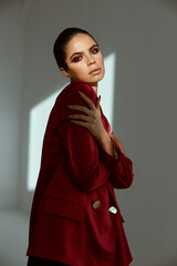 woman in red jacket bright cosmetics decoration Studio Model