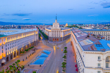 Wall Mural - Sunset view of Largo square in Sofia with national assembly building (written in cyrillic on the picture), Bulgaria