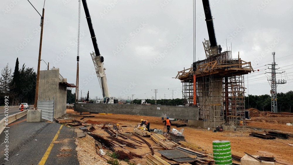 site with cranes, bridge construction , beams assembly , assembly ...