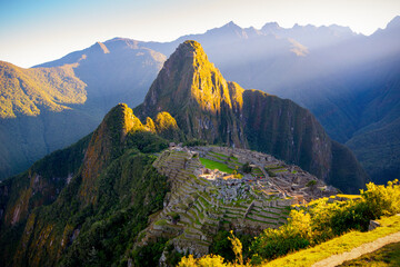 Sticker - The first rays of the sun on Machu Picchu , the lost city of inca - Peru