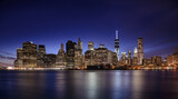 Fototapeta  - Skyscraper at night, high-rise building in Lower Manhattan, New York City