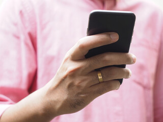 Married man using mobile phone