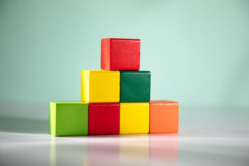 Canvas Print - Top view of wooden colorful cubes.