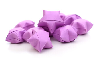 Wall Mural - Origami purple lucky stars pile on white