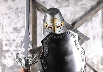 Wall Mural - portrait of a medieval knight in a helmet and armor