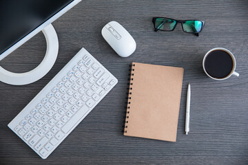 Wall Mural - notebook with computer keyboard and cup of coffee