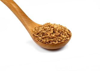 Wall Mural - Buckwheat flakes in a wooden spoon isolated on white background. Healthy buckwheat flakes. Healthy food.