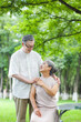© eastfenceimage - Happy old couple sitting on chairs in outdoor park