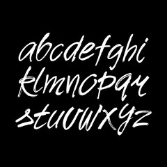 Wall Mural - vector acrylic brush style hand drawn alphabet font. calligraphy alphabet on a black background