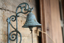 Close Up Old Vintage Metal Door Bell. Wood Manor In Latvia, Ramava. Old. Natural Light. Rustic Background. Welcome