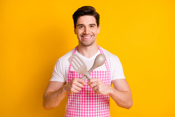 Sticker - Portrait of satisfied friendly person hands hold crossed cooking equipment isolated on yellow color background