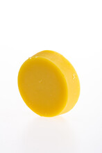 Yellow Round Piece Of Soap On A White Background. 