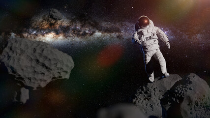 Wall Mural - astronaut during spacewalk in the asteroid belt