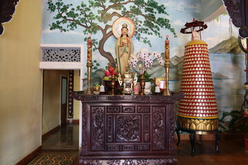 hoi an, vietnam, february 18, 2021: altar in the main hall of the phap bao temple. hoi an, vietnam