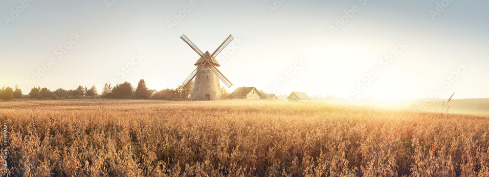 Rural landscape at dawn, terrain with oat fields and from the and a windmill and village on the hill. Raster illustration. - obrazy, fototapety, plakaty 