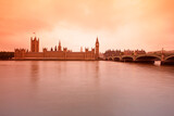 Fototapeta Big Ben - Palace of Westminster at sunset, viewed from across the river Thames, London, UK