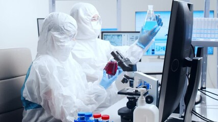 Wall Mural - professional team of scientists is working on a vaccine in a modern scientific research laboratory. 