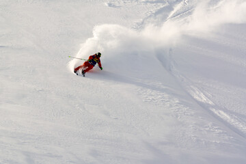 Sticker - Closeup shot of a skier goes down the mountain