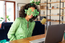 Caucasian Woman Dressed In Green With Shamrock Glasses Making St Patrick's Day Video Call