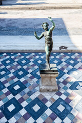 Statue of the Dancing Faun in Pompeii, Italy