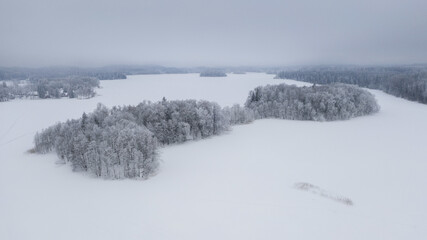 Sticker - Aerial shot of snow-covered mountains on a winter day