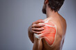 © BigBlueStudio - Shoulder muscle and nerve pain, man holding painful zone injured point, human body anatomy