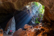 © robertharding - Sun rays shining in Saddan Cave, Hpa-An, Kayin state