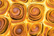 Cinnamon Dough Bun Rolls Traditional Danish Baked Sweet Autumn Cake Holiday Dessert Swirl Bread Food Close Up Texture.