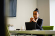 © Gerald R Carter Jr/Creative Flame - Young businesswoman sales consultant chatting in modern business office