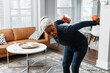 © Gerald R Carter Jr/Creative Flame - Senior Black woman exercising at home, active lifestyle fitness