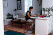 © Gerald R Carter Jr/Creative Flame - Professional Black woman working remotely from home, freelance consultant
