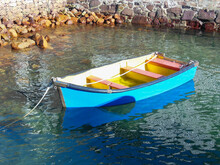 Colourful Blue Rowing Boat At Anchor