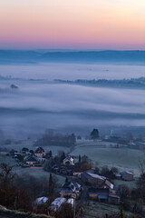 Poster - Yssandon (Corrèze, France) - Lever de soleil hivernal depuis le vieux bourg