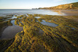 © Jose Luis Alvarez/ADDICTIVE STOCK - Liencres beach at sunset in a dreamy landscape in Cantabria, North of Spain.