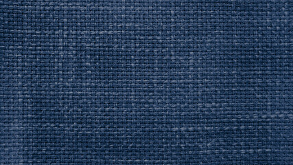 Wall Mural - blue jean linen texture, burlap fabric as background. close up beige weaving or mesh fabric texture background. close up cotton or fabric fiber background.
