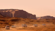 Convoy of tourist vehicles in Monument valley back roads