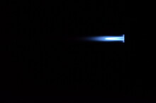 Blue Gas Jet Flame On Black Background