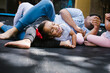© Marcos - mexican children playing with their father in backyard in home in Mexico city