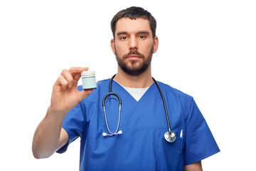 Sticker - healthcare, profession and medicine concept - doctor or male nurse in blue uniform with jar of pills and stethoscope over white background