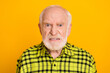 Photo of angry old man pensioner unhappy mad crazy conflict disagreement isolated over yellow color background